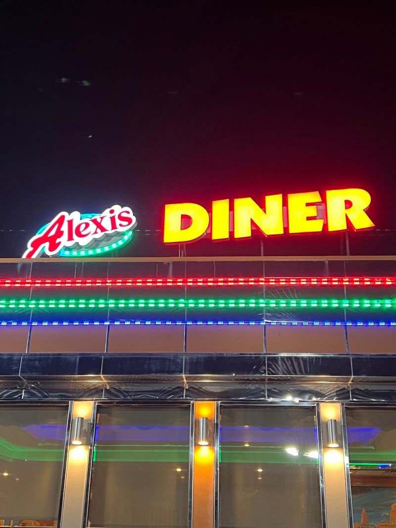 A Roadside Beacon With Green Neon And Big Ambitions