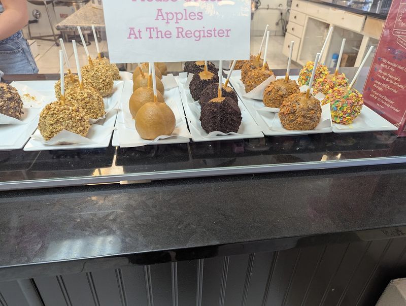Caramel Apples And Chocolate-Dipped Treats On Display