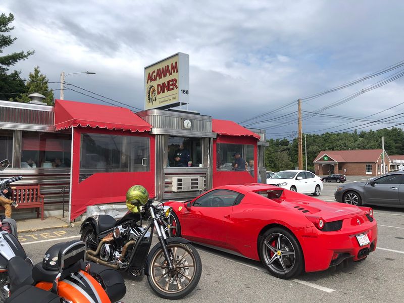 Chrome, Curves, And A Red Awning