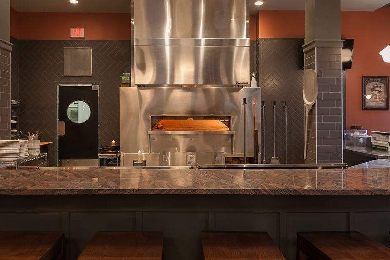 The Coal-Fired Magic Behind The Ovens