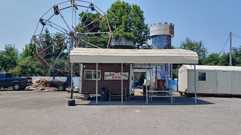 A Trailer Under Three Ferris Wheels