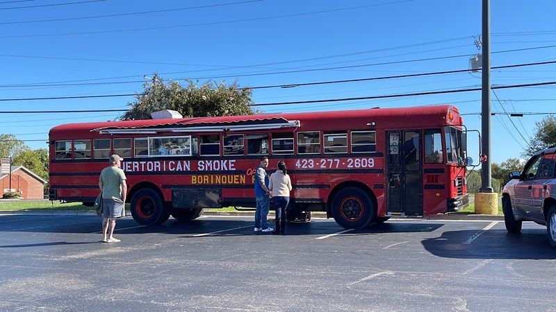 A Big Red Bus With An Island Heart