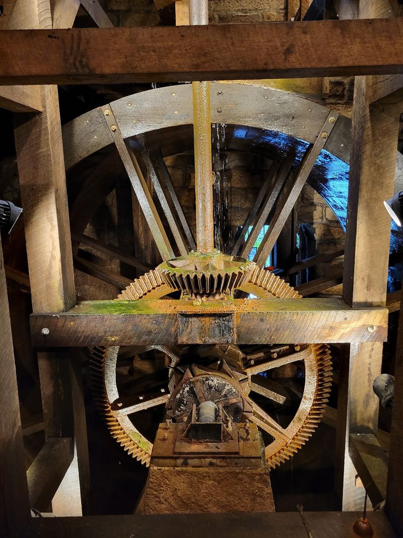 Watching The Water Wheel Do Its Work