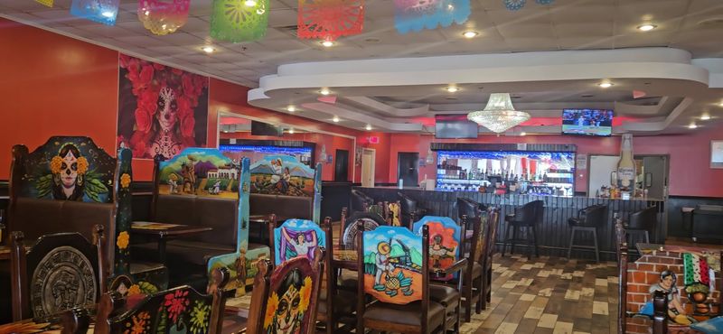 Artwork And Painted Tables That Set The Mood