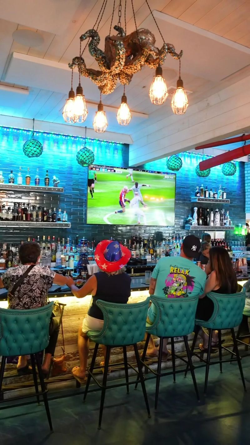 Happy Hour Sits At The Bar Four Days A Week