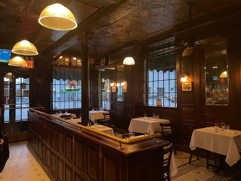 Mahogany Walls And A Glowing Tin Ceiling