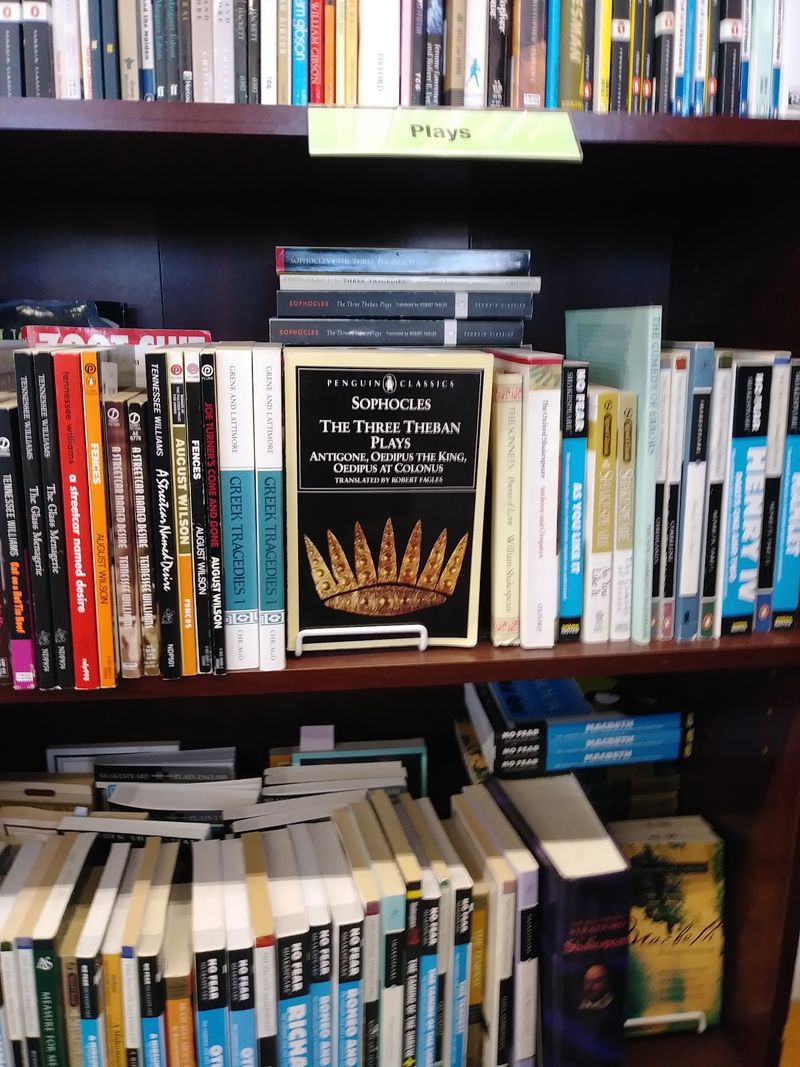 Comics, DVDs, And Shelves In Two Languages