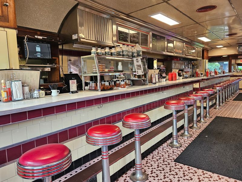 Chrome Stools And Cozy Booths