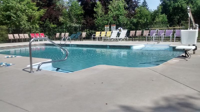 Summer Days Come With A Pool And Plenty Of Green Space