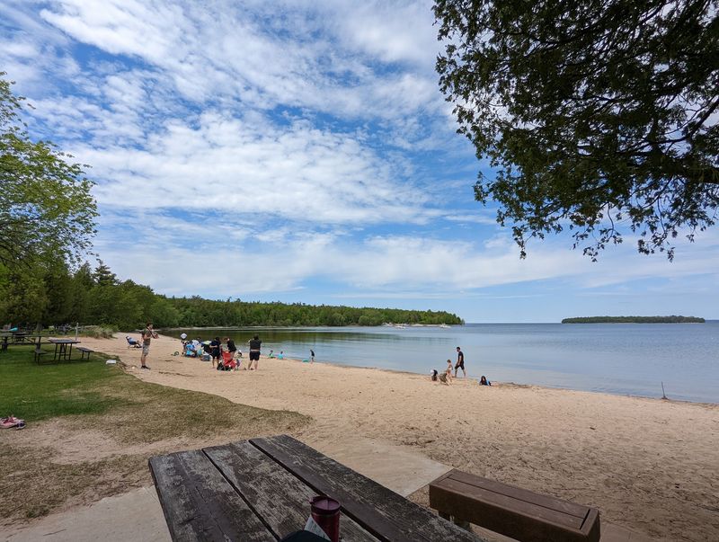 Sandy Toes And Paddles Wait At Nicolet Beach