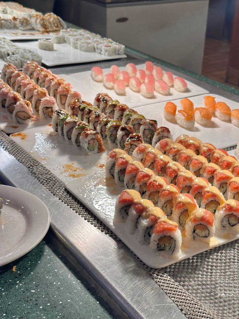 A Sushi Station Waits Near The Fried Rice