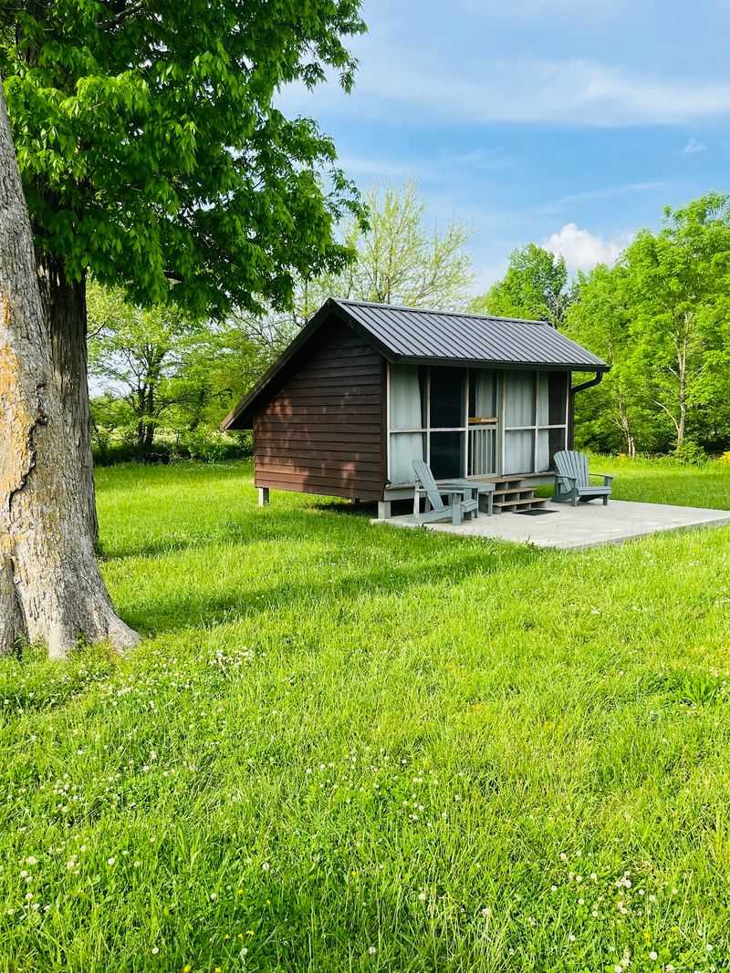 Sleep Beside The Creek In An Open-Air Cabin