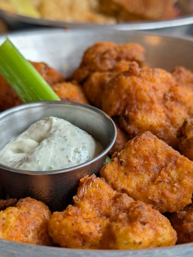 Start With Wings, Tots, And Cornbread Before You Even Look At Mains