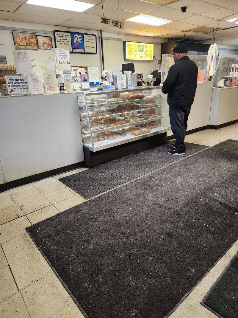 A South Side Donut Counter With Over 50 Years Of Glaze Behind It