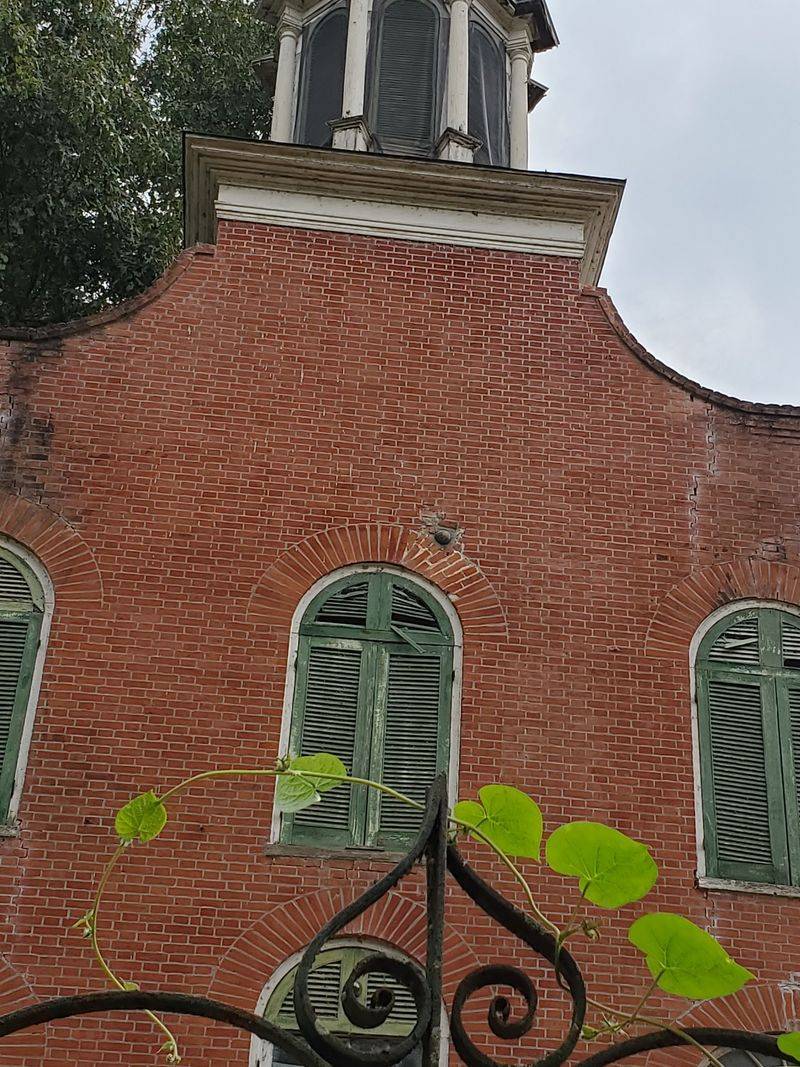 The Cannonball Above The Balcony Windows