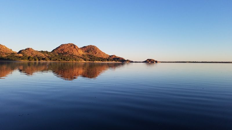 Granite Peaks And Tea-Colored Water
