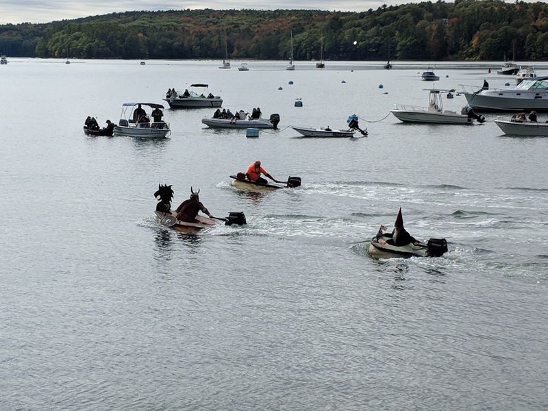 Racing Across The Harbor In Pumpkin Boats