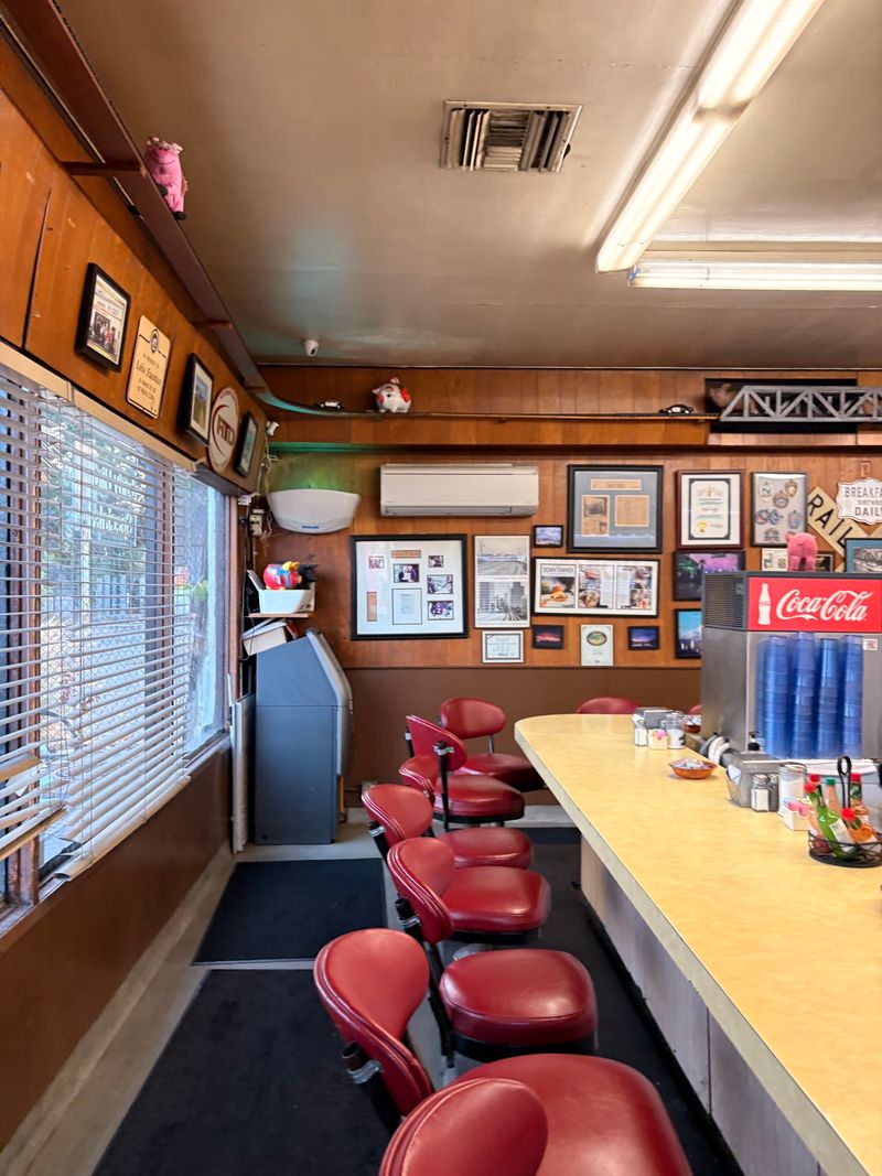 Red Stools And Old Photos Turn Breakfast Into Time Travel