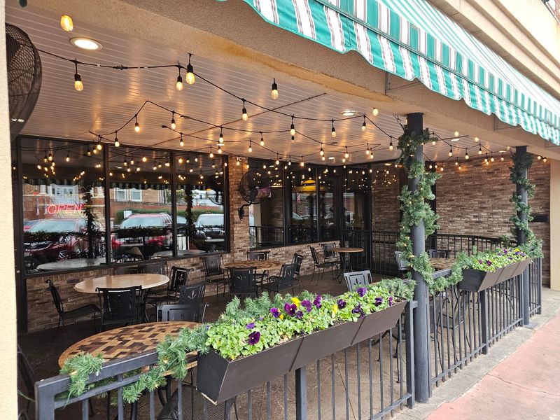 A Covered Patio In Historic Downtown
