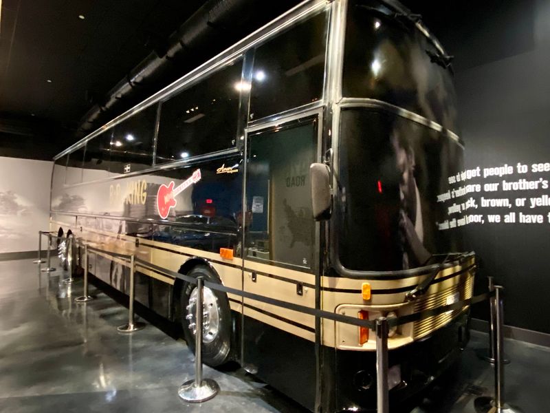 The Rolls Royce and the Tour Bus