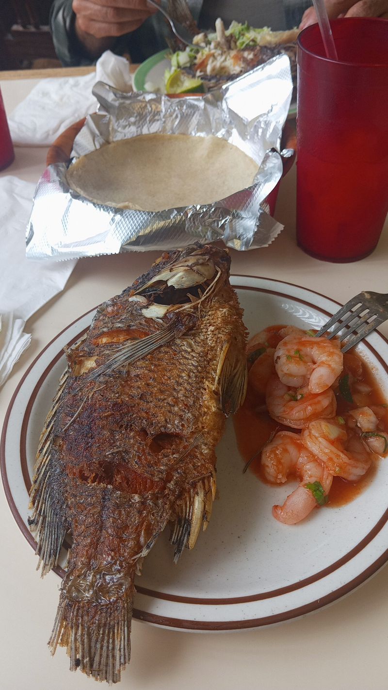 Yes, That Is A Whole Fried Fish Staring Back