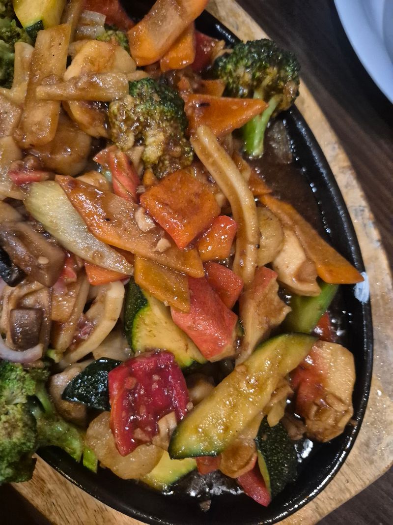 Sizzling Iron Platters Bring A Little Drama To Dinner