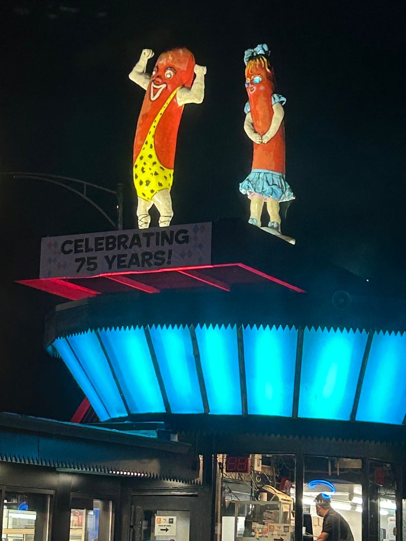 Neon, Checkered Canopies, and Late-Night Buzz