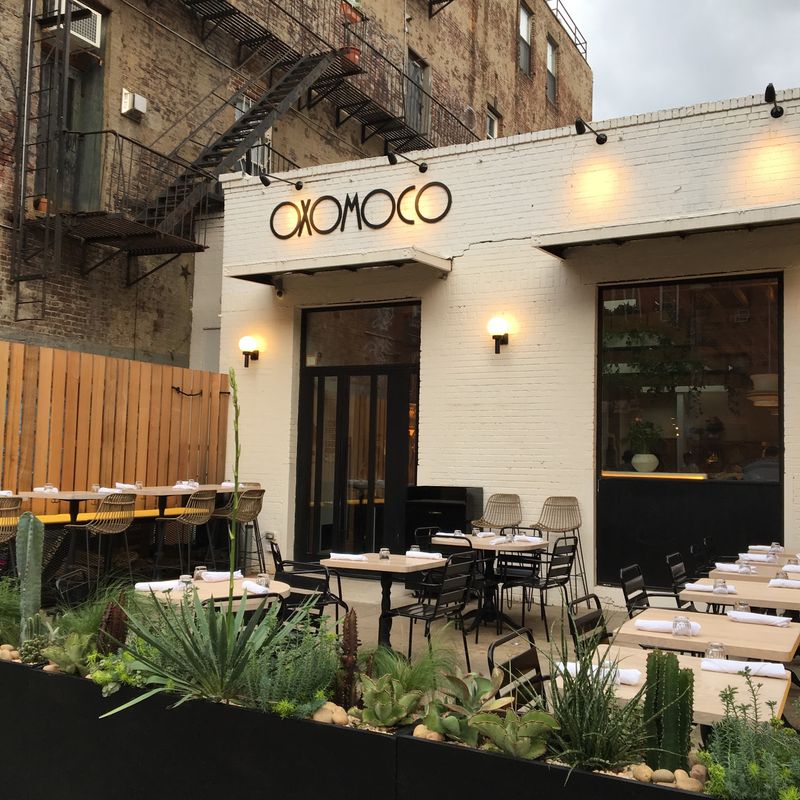 Wood Smoke And Green Plants In Greenpoint