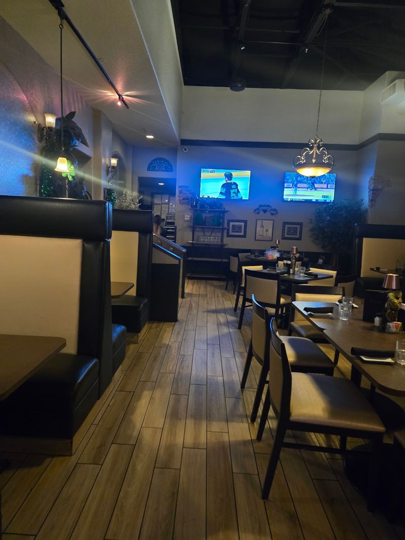 Cozy Booths, Game Day Screens, And Friendly Faces