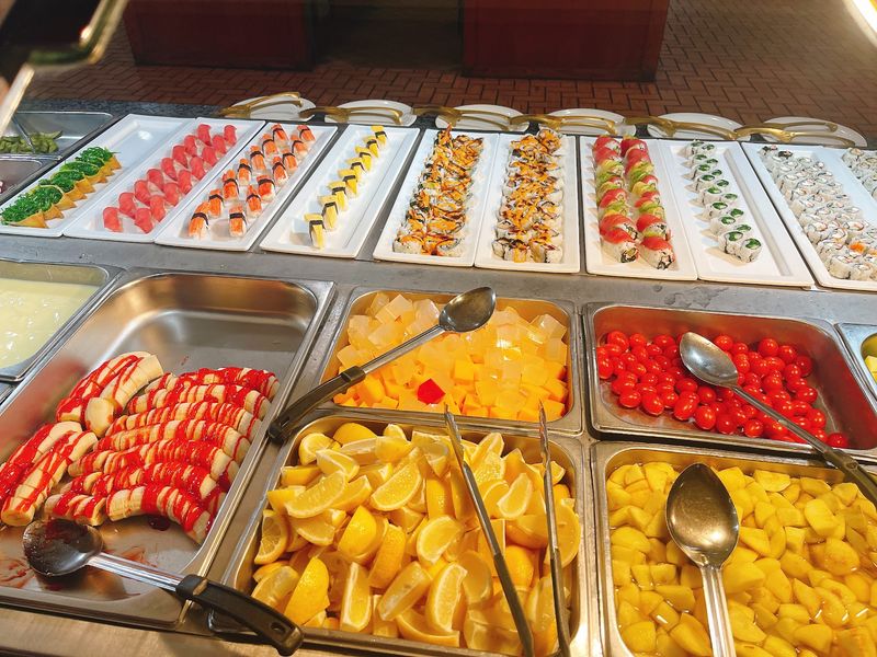 Sushi, Desserts, And A Fish Pond Up Front