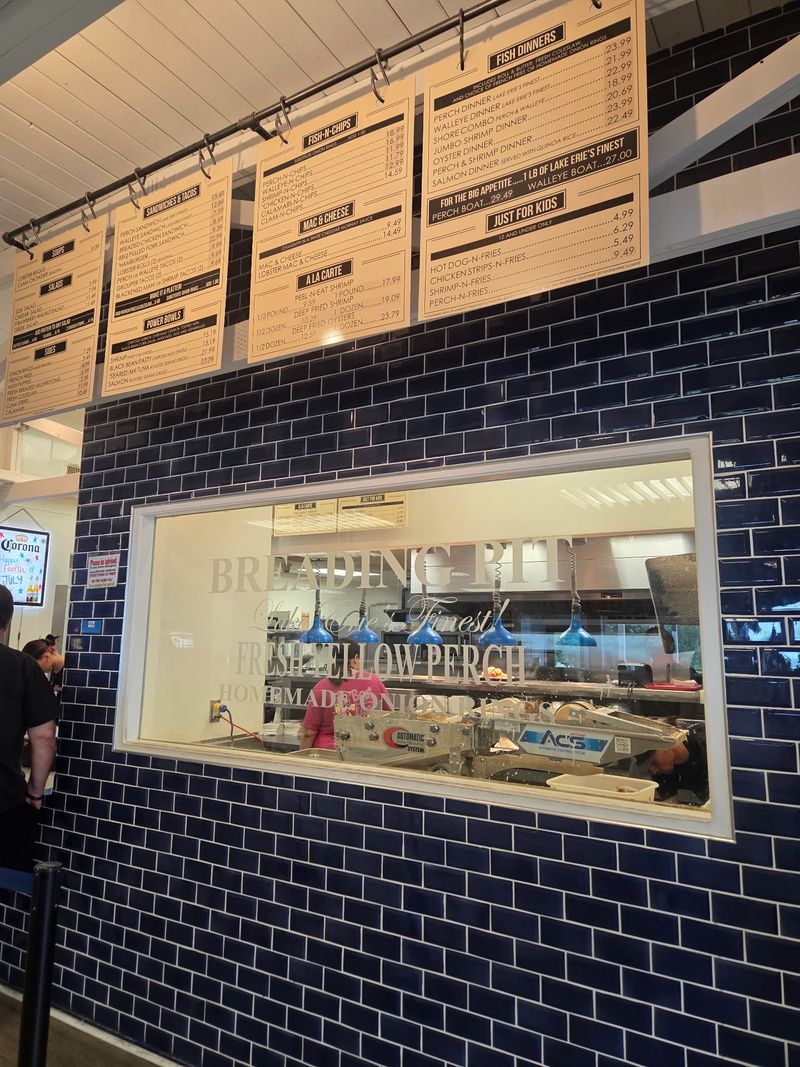The Fish Breading Window Keeps Kids Busy In Line