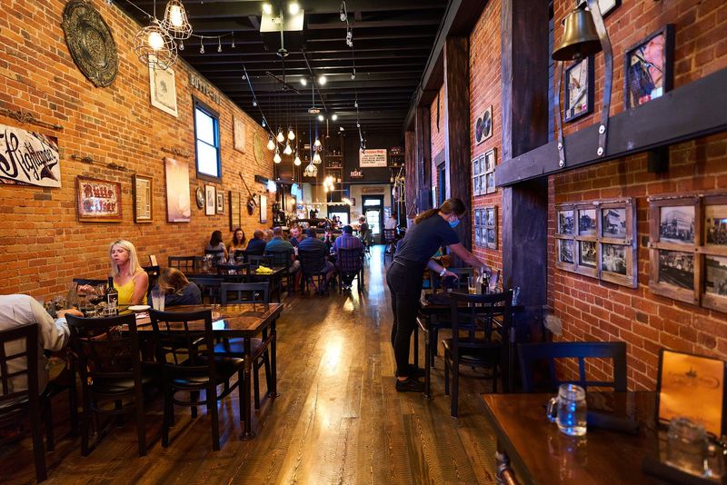 Brick, Copper, and Warm Light Set the Mood
