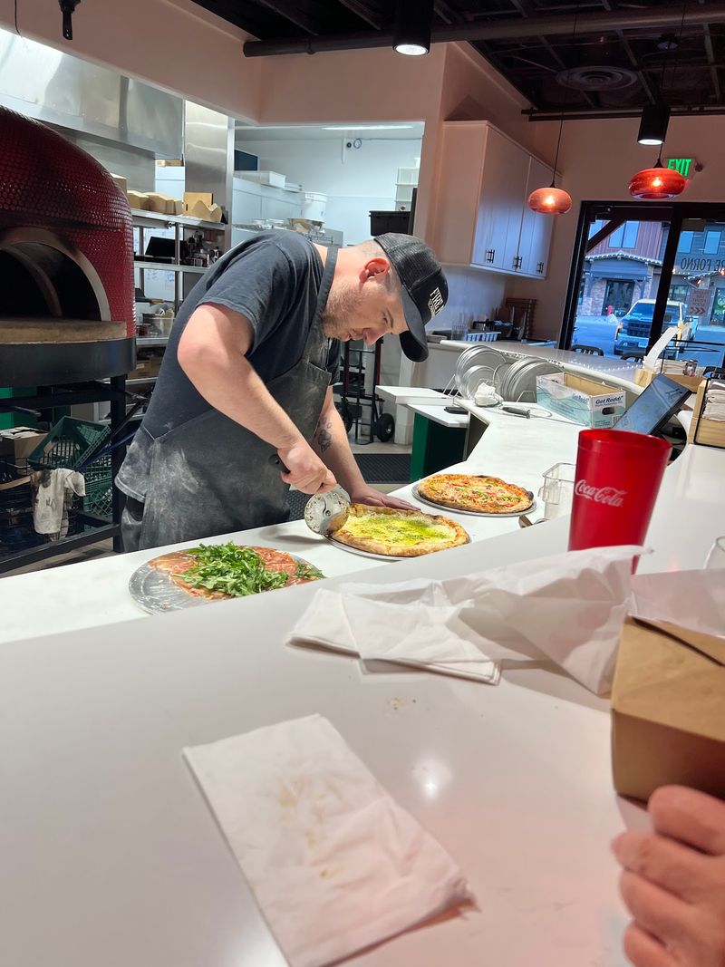 Pull Up A Seat And Watch The Pizza Magic