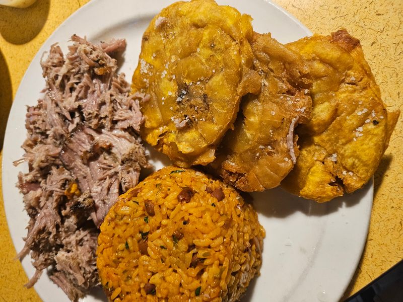 Slow-Roasted Pernil Earns Its Spot At The Center Of The Plate