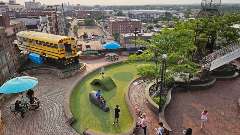 The Rooftop Brings A Ferris Wheel And A Dangling Bus
