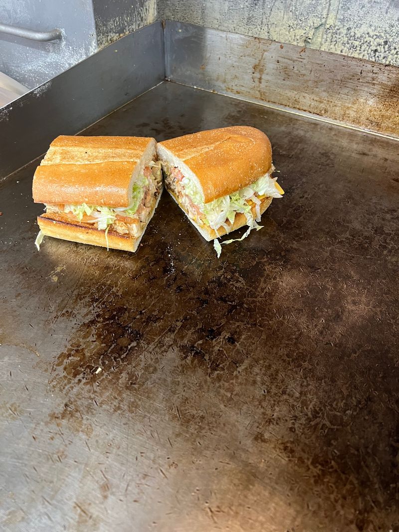 The Sandwich Maker Clearly Loves His Job