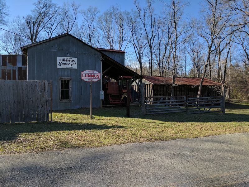 The Cotton Gin and Farm Buildings Out Back