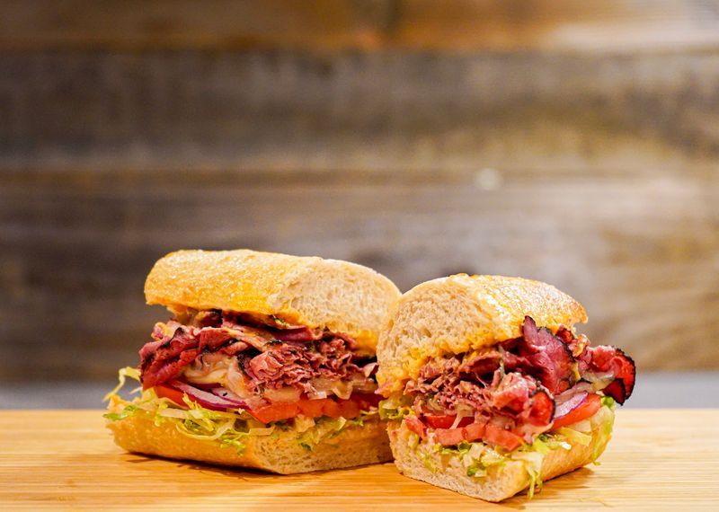 Pastrami Piled So High You Need Both Hands