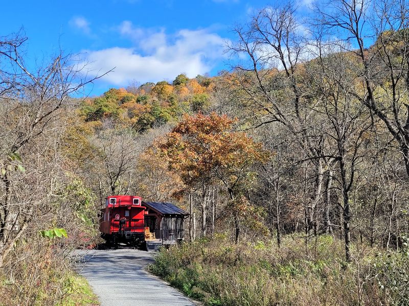 A Cozy Railroad Car With Room For Four