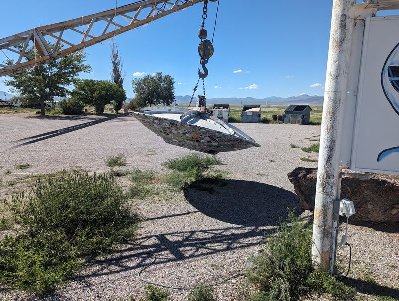 A Flying Saucer Hanging Out Front Like It Got Towed
