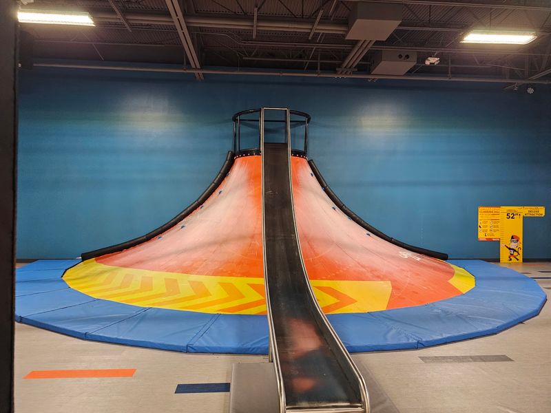 A Mini-Mountain With A Slide Waiting At The Top