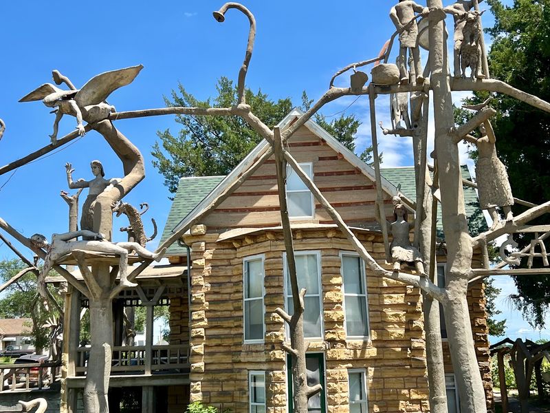 A Stone Cabin That Pretends To Be Logs