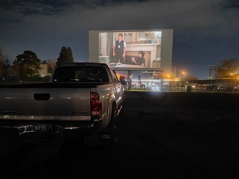 A Four-Screen Throwback Still Lighting Up The Night
