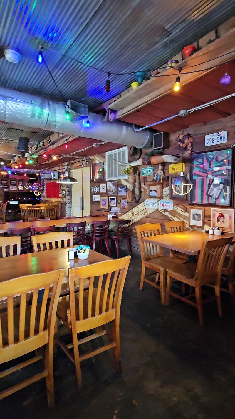 License Plates On The Walls, Rib-Eyes On The Grill