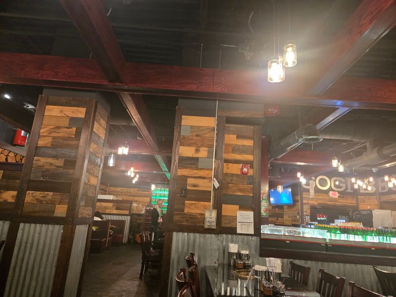 A Grill At Every Table And A Hungry Crowd Of Cooks