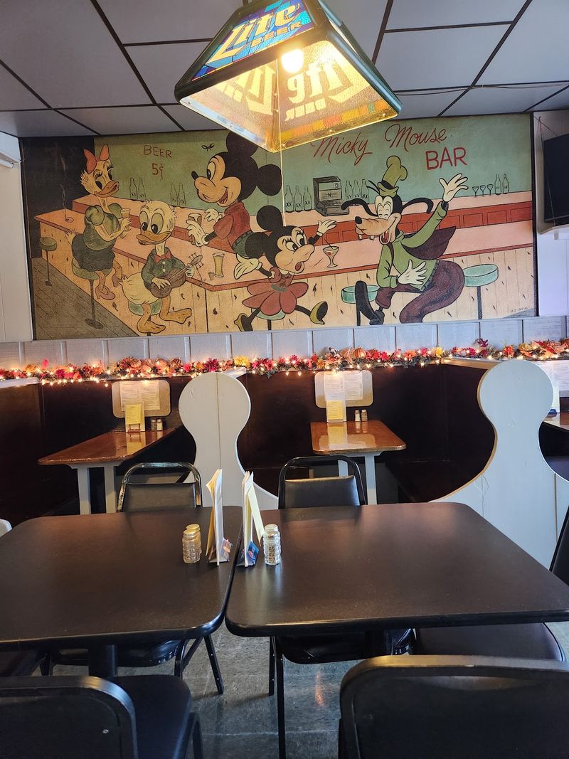A Famous Cartoon Mouse Watches Over Every Table