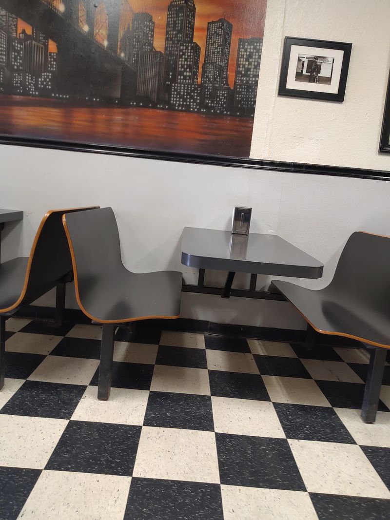 Checkered Floors, Booths, And A Classic Arcade Game
