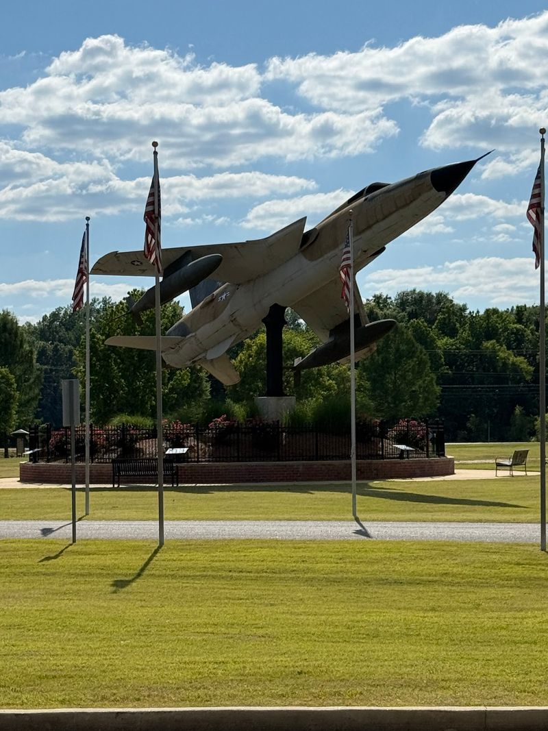 Aircraft, Armor, And A Wall Of Flags