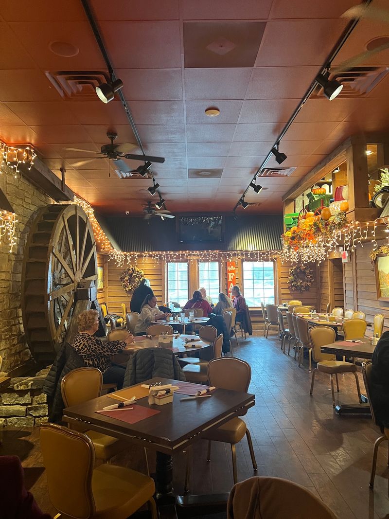 Dining Beside A Turning Water Wheel