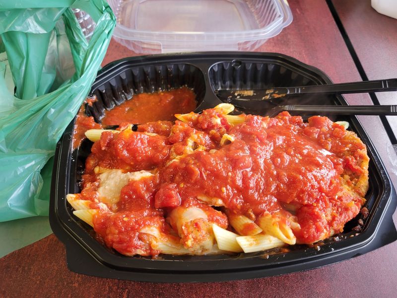 Chicken Parm Might Steal The Spotlight From The Donuts